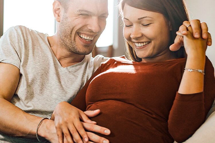 portrait of young happy pregnant woman