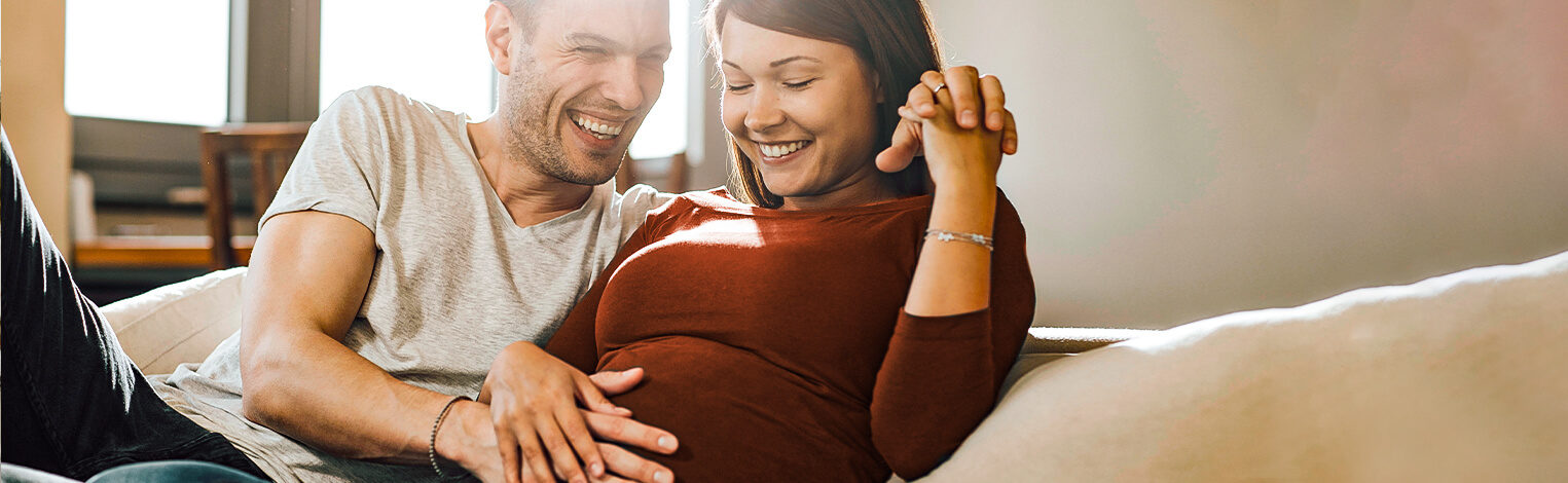 portrait of young happy pregnant woman